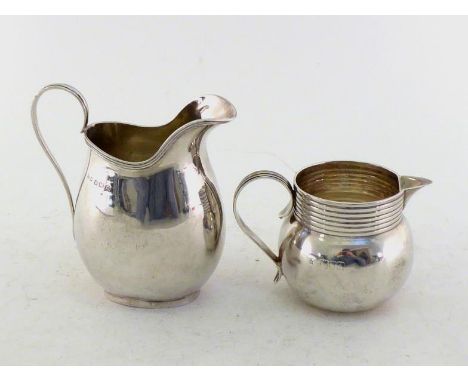 A silver cream jug of ovoid form with reeded rim by Charles Weale, Birmingham, 1931; also a late Victorian bulbous silver cre