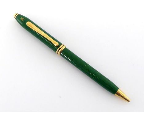 Cross, a green and gold lacquer roller ball pen, with Chinese character to the cap, no box or paperwork CONDITION: in working