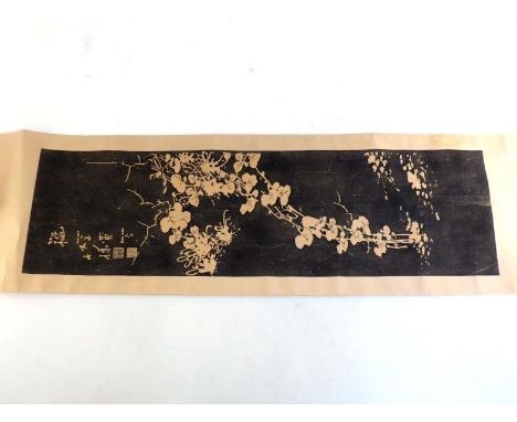 A Chinese scroll rubbing from a carved stone tablet, pattern depicts a branch of flowers, signed and marked  “Zheng Banqiao”.
