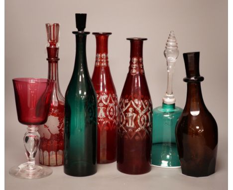 A pair of cut ruby flashed glass decanters, late Georgian emerald green glass decanter, and four other items