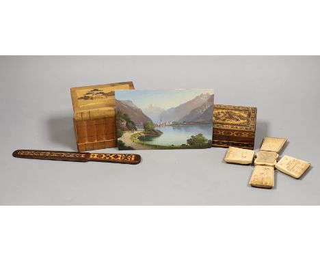 A 19th century Swiss oil on panel, a Tunbridgeware box and paperknife and other wood wares