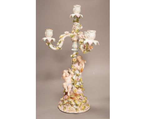 A Sitzendorf porcelain three branch, four light candelabrum, 45cm