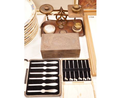 A postal scale, cased silver lobster picks, silver cocktail sticks etc