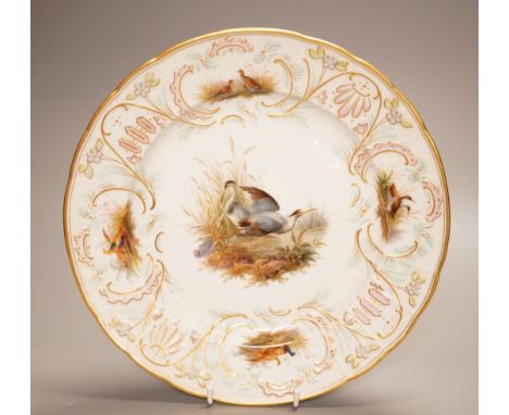 A late 19th century Meissen porcelain plate, painted with herons and game birds amid grass, diameter 25cm