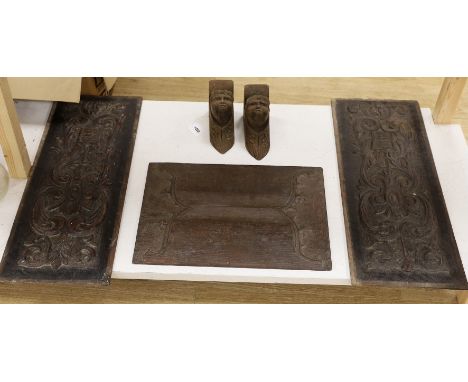 Three carved oak panels and a pair of brackets, one linenfold oak panel carved ‘from Crowland Abbey’, 46 cm X 33 cm