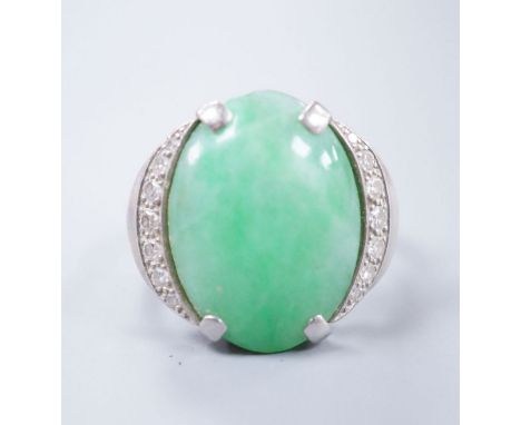 A diamond and jade set white metal dress ring, size K