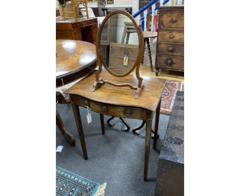 A George III-style serpentine mahogany side table, width 60cm, depth 42cm, height 71cm and a skeleton framed toilet mirror