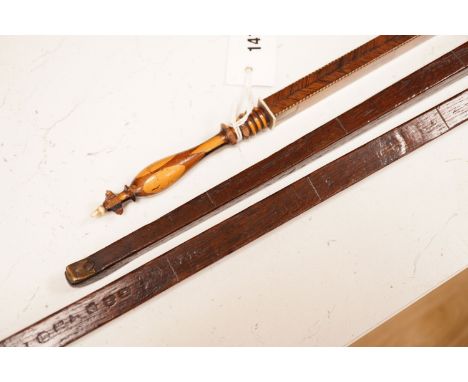 Three assorted 19th century treen measuring sticks to include a kingwood feather banded and marquetry inlaid measuring stick 