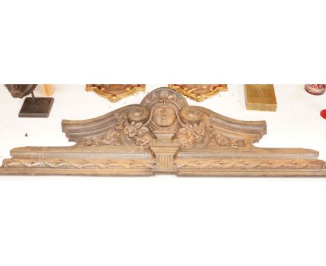 A wall mounted cast iron architectural pediment, 101cm