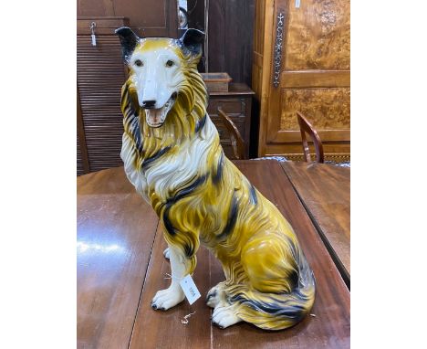 A mid 20th century ceramic figure of a seated collie, height 68cm