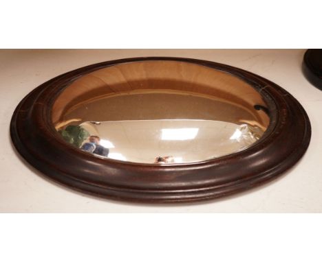 An unusual 19th century oval framed convex wall mirror, 44x54cm including frame