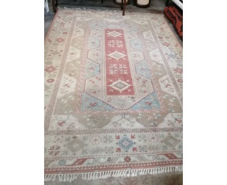 A Caucasian style polychrome geometric carpet, 360 x 260cm