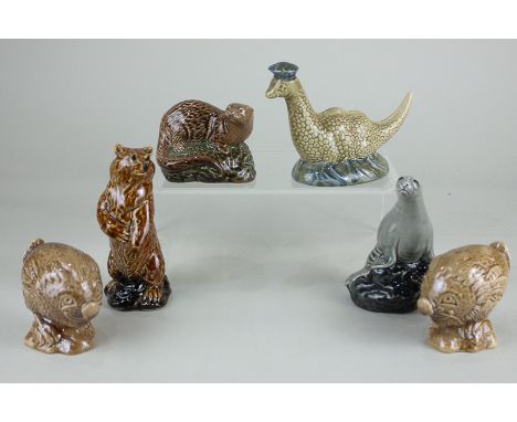 Five Beswick model whisky flasks comprising Loch Ness Monster, grey-green, gloss, 9cm, two haggis birds, brown, gloss, 7cm, a