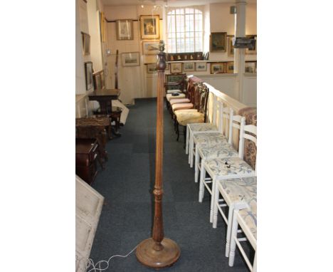 A mahogany fluted standard lamp on circular base, 154cm, high