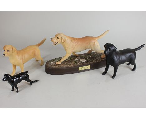 A Beswick model of a labrador on ceramic plinth, golden, matt, from the Spirited Dogs series, 16.5cm including base, together