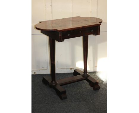 A Victorian rosewood side table with frieze drawer and opposing dummy drawer, on tapered end supports united by a platform st