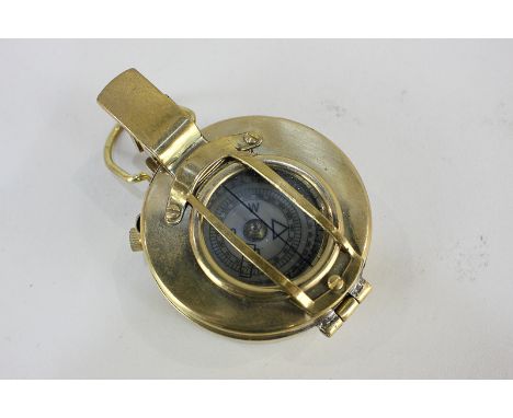 A replica brass compass marked MK IX (B13066) F Barker & Son Ltd, London 1939