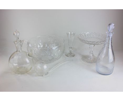 A glass fruit bowl, two decanters with stoppers, a tazza, wine flute (a/f) and ladle