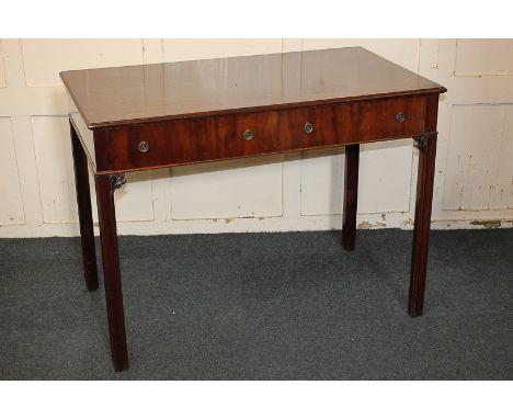 A mahogany rectangular side table with two drawers, on square chamfered legs, 106cm