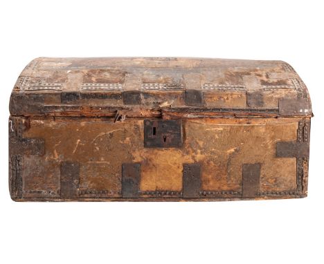 A George III horse hide covered domed top coaching trunk, late 18th century; with riveting and metal strengthening plates at 
