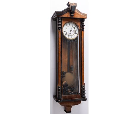 A timepiece Vienna style wall clock: the eight-day duration, weight-driven movement having a dead-beat escapement and maintai