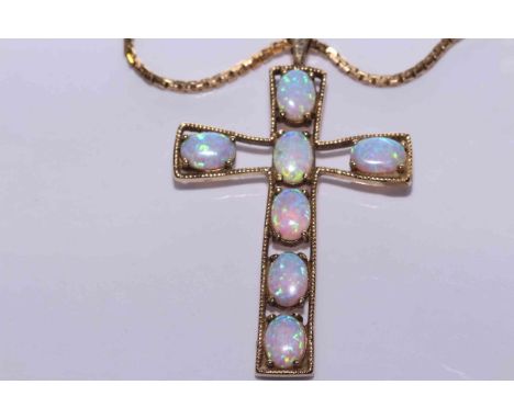 9 carat gold and opal pendant on a chain stamped 750