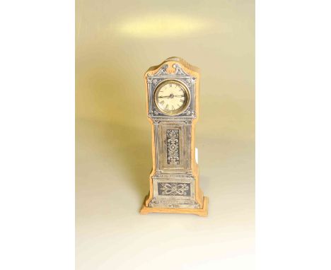 Silver mounted clock in the form of a longcase clock, with watch movement