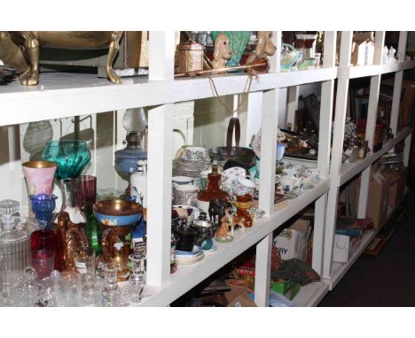 Full shelf of glass, china, pictures, metalware, bed pan, spirit miniatures, oil lamp and collectables