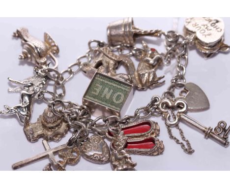 Charm bracelet with some silver charms