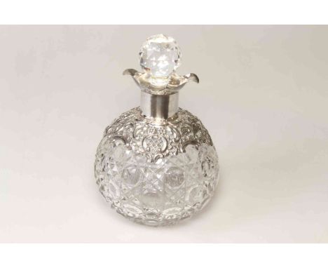 Large silver and cut-glass scent bottle