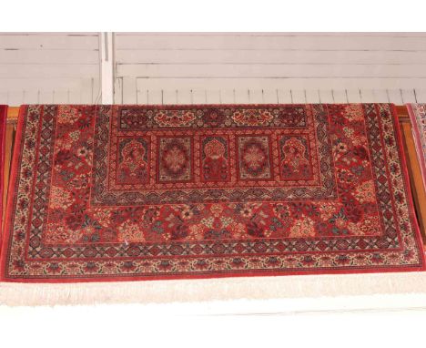 Keshan carpet with a red ground 3.00 x 2.00