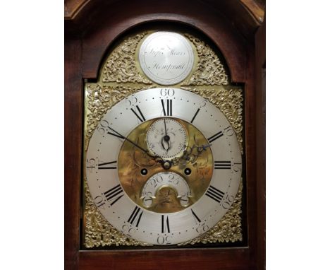 An 18th Century long case clock the eight day movement with brass arch dial and silver chapter ring with Arabic and Roman num