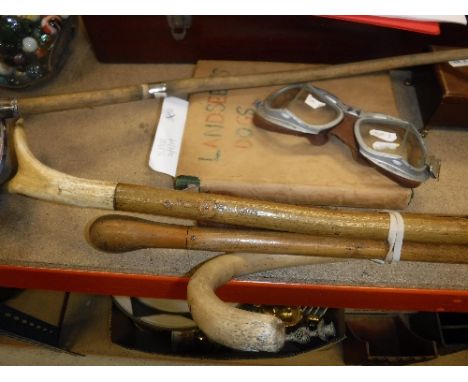 A collection of sporting-related items, to include a pair of vintage flying goggles, Landseer's Dogs (one volume), Munnings p