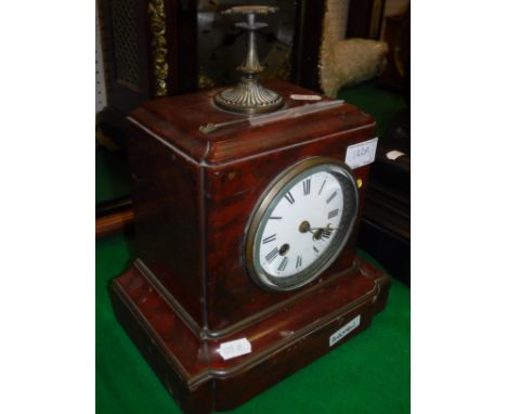 A 19th Century French Rosso marble cased mantel clock, the eight day movement by A Godeau of Paris with white enamel dial and