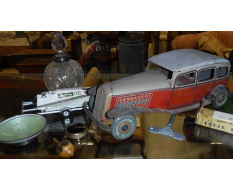 A collection of items to include an English tin plate model of a Citroen Rosalie, circa 1934, bearing Dunlop 90 tyres and ins