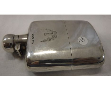 A George V silver hip flask (by James Dixon &amp; Sons, Sheffield 1921), the removable base with gilt-washed interior as cup,