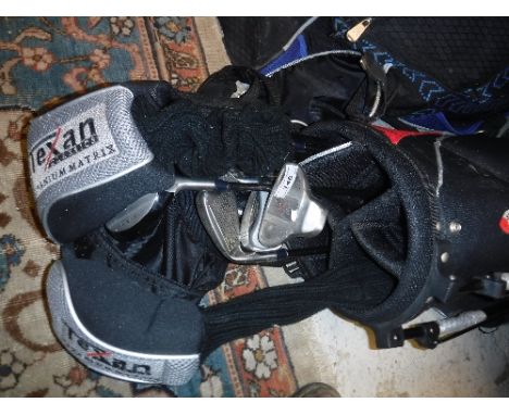 A golf bag and contents of Texan Titanium Matrix golf clubs including three drivers, six irons and putter together with a Gun