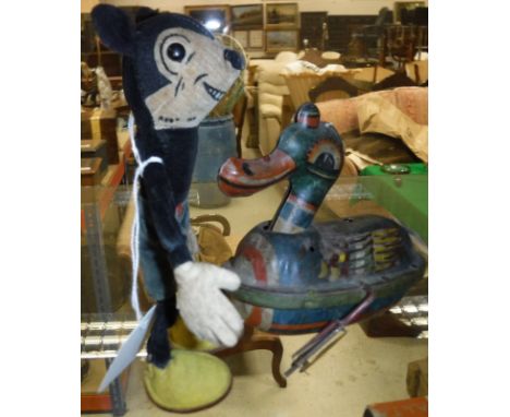 A 1930's Dean's velvet Mickey Mouse "Jazzer" figure with Regd. No. 750311 to neck, together with a German clockworth lithogra
