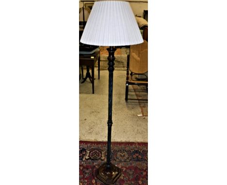 A modern lacquered brass standard lamp of rope twist form