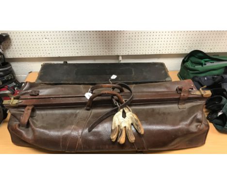 A vintage leather and brass embellished cricket bag of Gladstone style