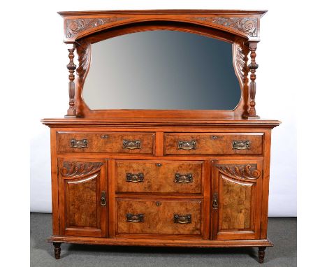 Walnut and burr walnut mirror-backed sideboard, early 20th century, the back with arched and shaped bevelled mirror framed by