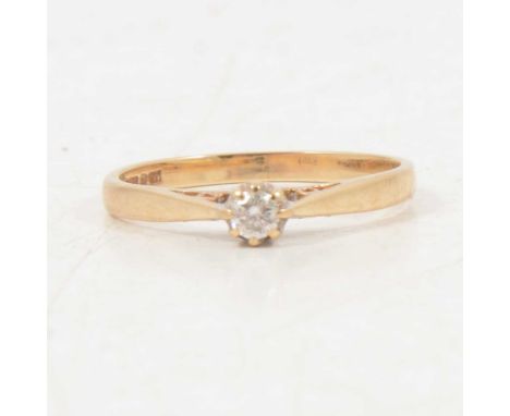 A diamond solitaire ring, the brilliant cut stone claw set in a 9 carat yellow gold mount ring size M1/2, 1.95mm gauge shank,