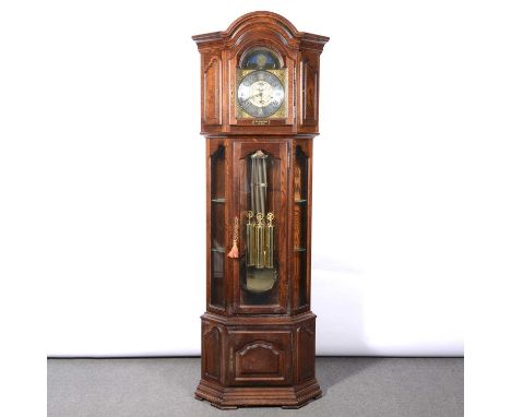 Modern oak case corner longcase clock, movement striking on gongs, triple weight driven, brass arched dial with moon phase, b