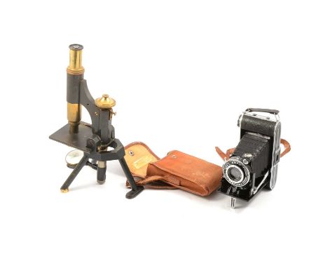 A J Swift &amp; Sons of London monocular microscope and an Agfa Prontor II folding camera in canvas case.