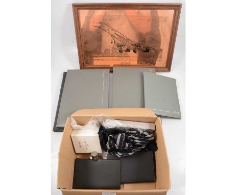 Concorde memorabilia, including two leather folders, two plastic folders, tie, scarf, pins, etc.