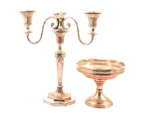 A silver-plate on copper three-light candelabra, inverted tapered column, octagonal knop with swag design, scroll arms, octag