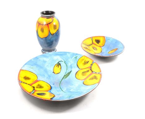 A Poole Pottery Wild Poppy pattern wall charger, 40.5cm; bowl, 27cm; and ovoid vase, 25.5cm.Qty: 3Condition report:Large char