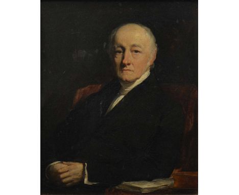 Scottish School, early 19th Century,Portrait of Rev'd George Muirhead, half length seated at a reading table,oil on board, un