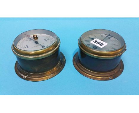 A brass Sestral clock and a barometer