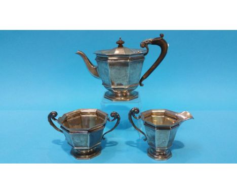 A matched three piece silver tea service, various marks and dates, 34.8ozts